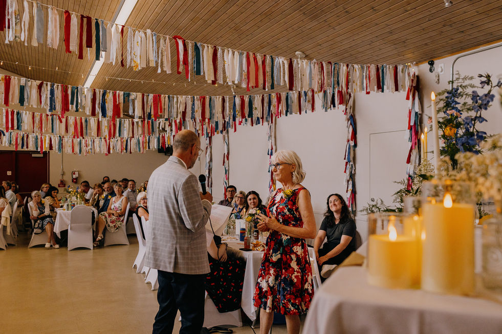 candid photography of speeches at a wedding in Calgary