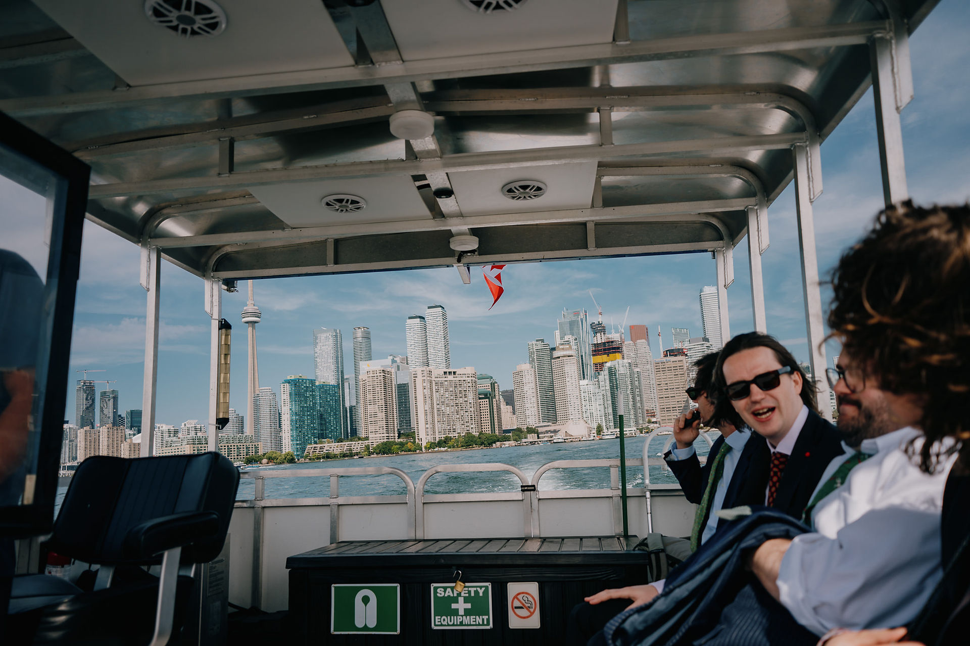 taking a water taxi to Toronto island for a wedding