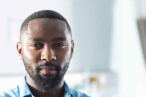 portrait-of-african-american-male-doctor-in-sunny-2023-11-27-05-11-43-utc.jpg