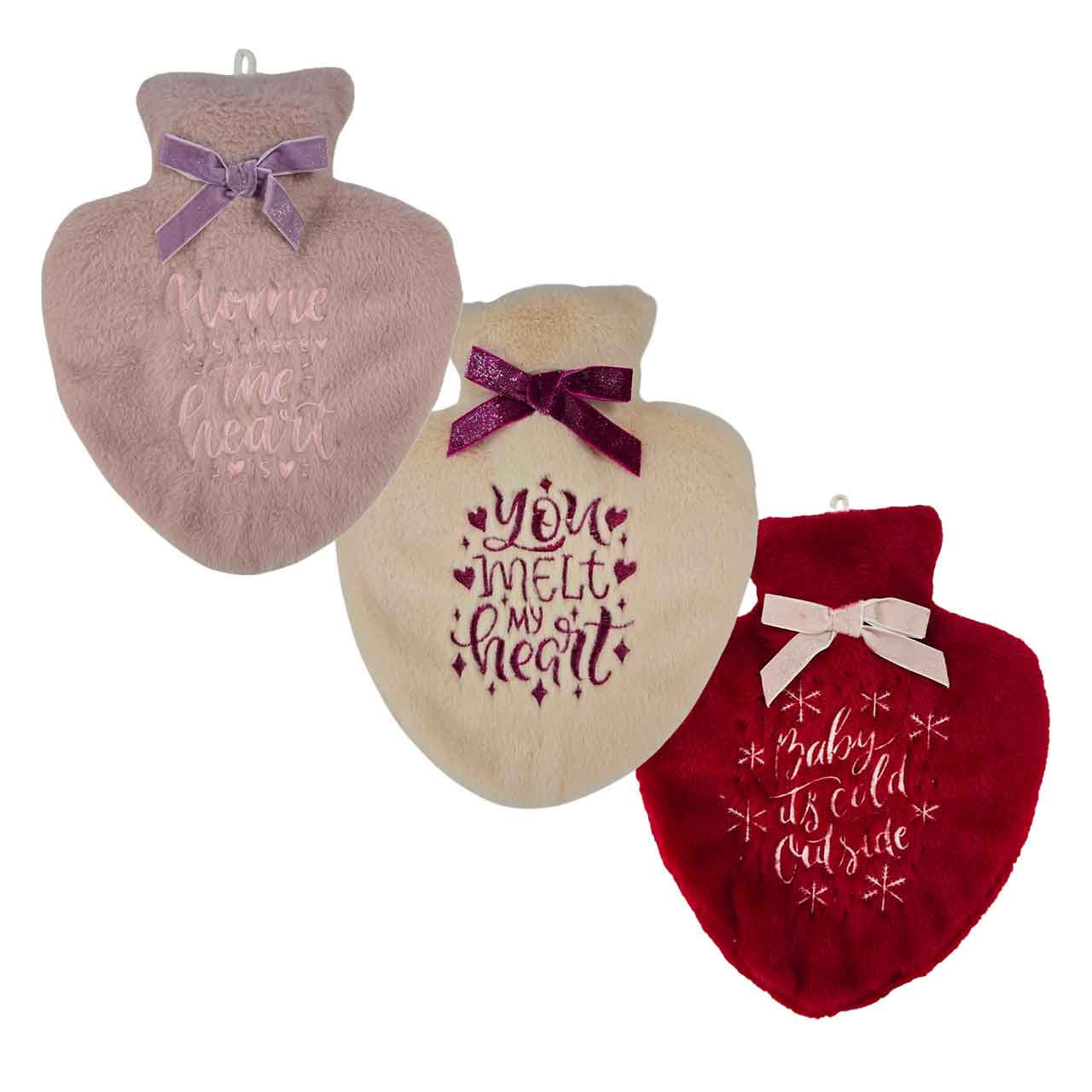 Tre hjerteformede varmeflasker med teksten: You melt my heart, outside is cold.