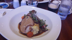 Bangers mashed potatoes pork chop
