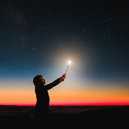 person-holding-roman-candle-at-night-799