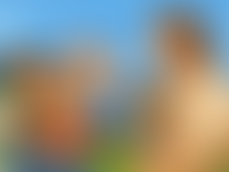A cheerful digital illustration of the author, sitting on the grass in jeans and a black tank top with her young son, surrounded by Blippi, Chase from PAW Patrol, Steve from Minecraft, and a figure resembling Jesus, all under a sunny blue sky.