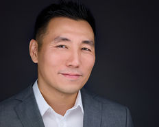 Professional headshot of man