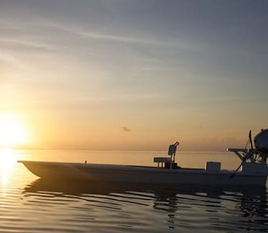 Sunset over skiff