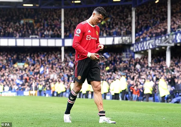 Cristiano Ronaldo is charged with improper conduct by the FA for slapping a mobile phone out of teenage fan's hand