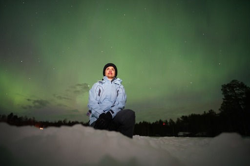 A lady watching the Northern Lights