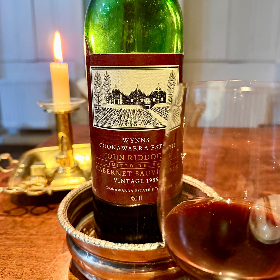 A bottle and glass of Wynns Coonawarra Estate John Riddoc Cabernet Sauvignon 1986, Australian red wine