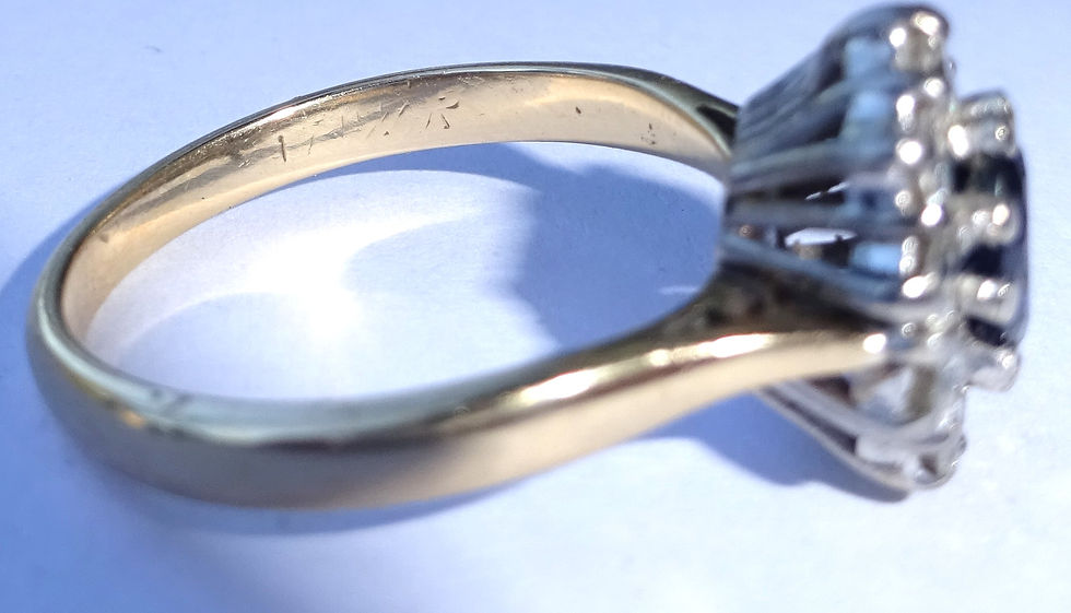 Thumbnail: Edwardian 18ct gold sapphire and diamond cluster ring with platinum basket setting and approximately 1.00ct old-cut diamonds.