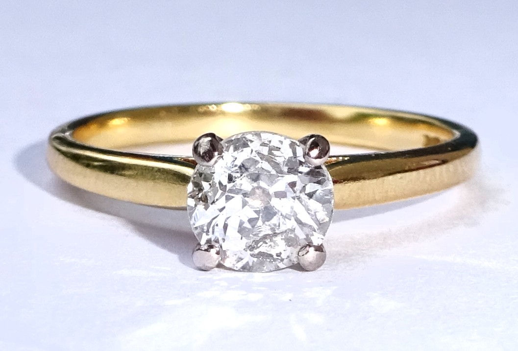 18ct gold high set diamond solitaire ring