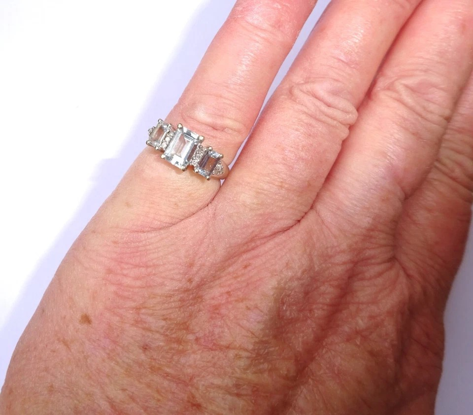 Thumbnail: 9ct White Gold Emerald Cut Aquamarine & Diamond Three Stone Ring, Size I1/2