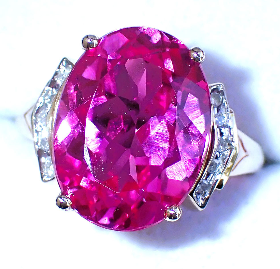 Thumbnail: Large 10ct gold pink sapphire and diamond high set cocktail ring.