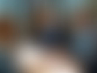 Professional business acquisition meeting in Pennsylvania: buyer reviewing purchase agreement, diligence checklist, and closing documents with counsel in a modern conference room; subtle courthouse or Pennsylvania skyline element; realistic, high-resolution, corporate style.