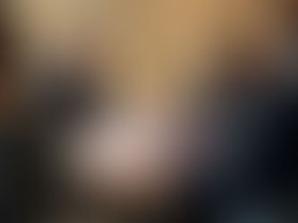 Business executives reviewing compliance documents during an internal audit meeting.