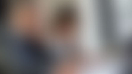 Business owner meeting with a Pennsylvania business sale attorney to review seller representation documents for a business sale (Todd Nurick, Nurick Law Group)