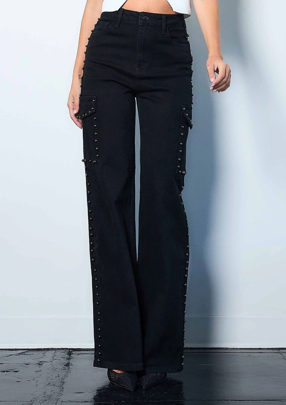 Thumbnail: Black high-waisted wide leg jeans with stud detailing, utility pockets, and a flattering straight fit.