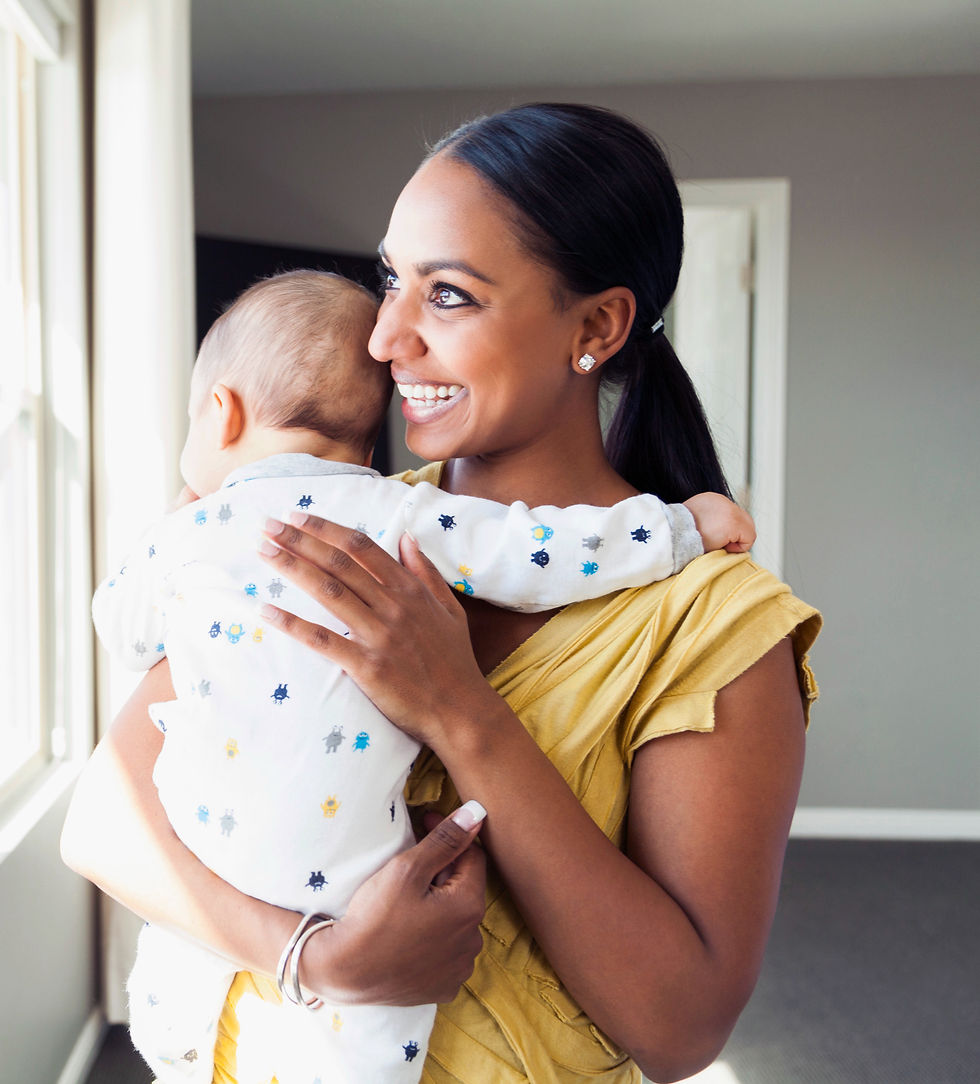 mom hugging baby