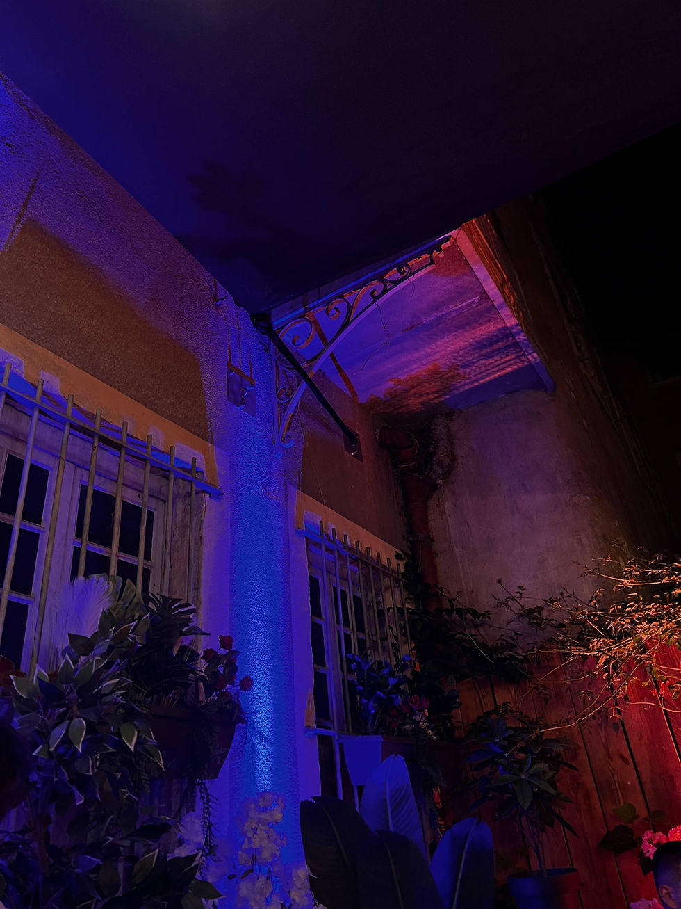 a building inside lit up in different colours