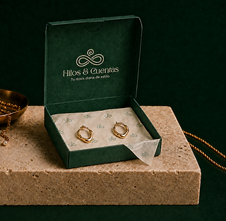 Packaing caja verde con aretes.
