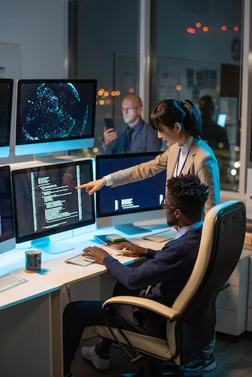 young-asian-businesswoman-pointing-computer-screen_274679-30943.webp