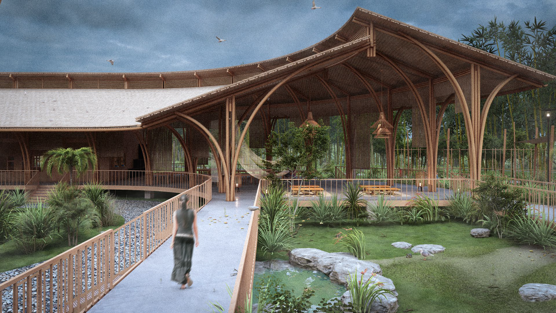 Elevated pedestrian walkway weaving through lush landscaping towards the open-air curved bamboo convention hall