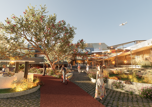 Eye-level view of the landscaped pedestrian approach with bicycle paths, flowering trees and the perforated screen facade
