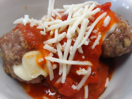 Mozzarella Stuffed Italian Meatballs With Marinara Sauce