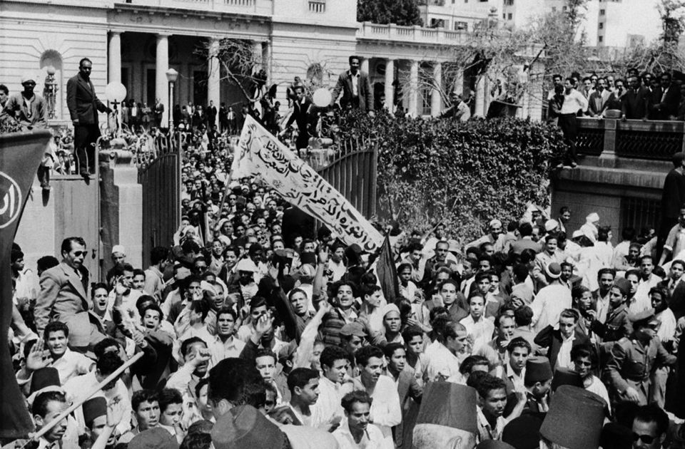 Egypt A large crowd storms into the Ministry Council Headquarters 28 March 1954 in Cairo