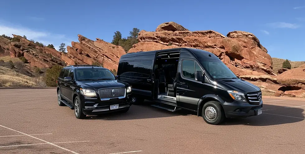 Luxury black Mercedes Sprinter van parked at Red Rocks Amphitheatre during sunset before a concert.