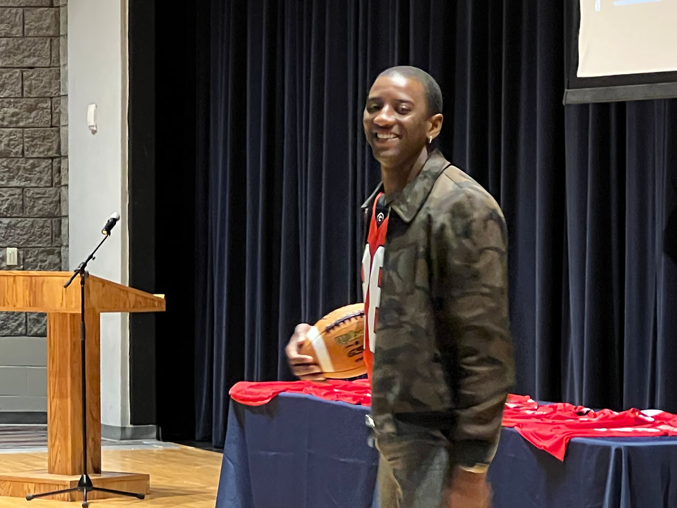 Photo: American author, poet, and former professional football player, Malcolm Mitchell  celebrated reading with students at One Book Habersham