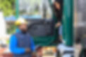a-man-in-a-blue-vest-talks-to-hispanic-female-driv-2025-02-20-06-13-23-utc_edited.jpg