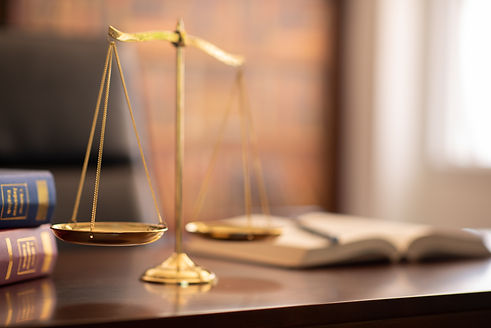 justice legal and jurisprudence concept.scales of justice and law books on lawyer desk at