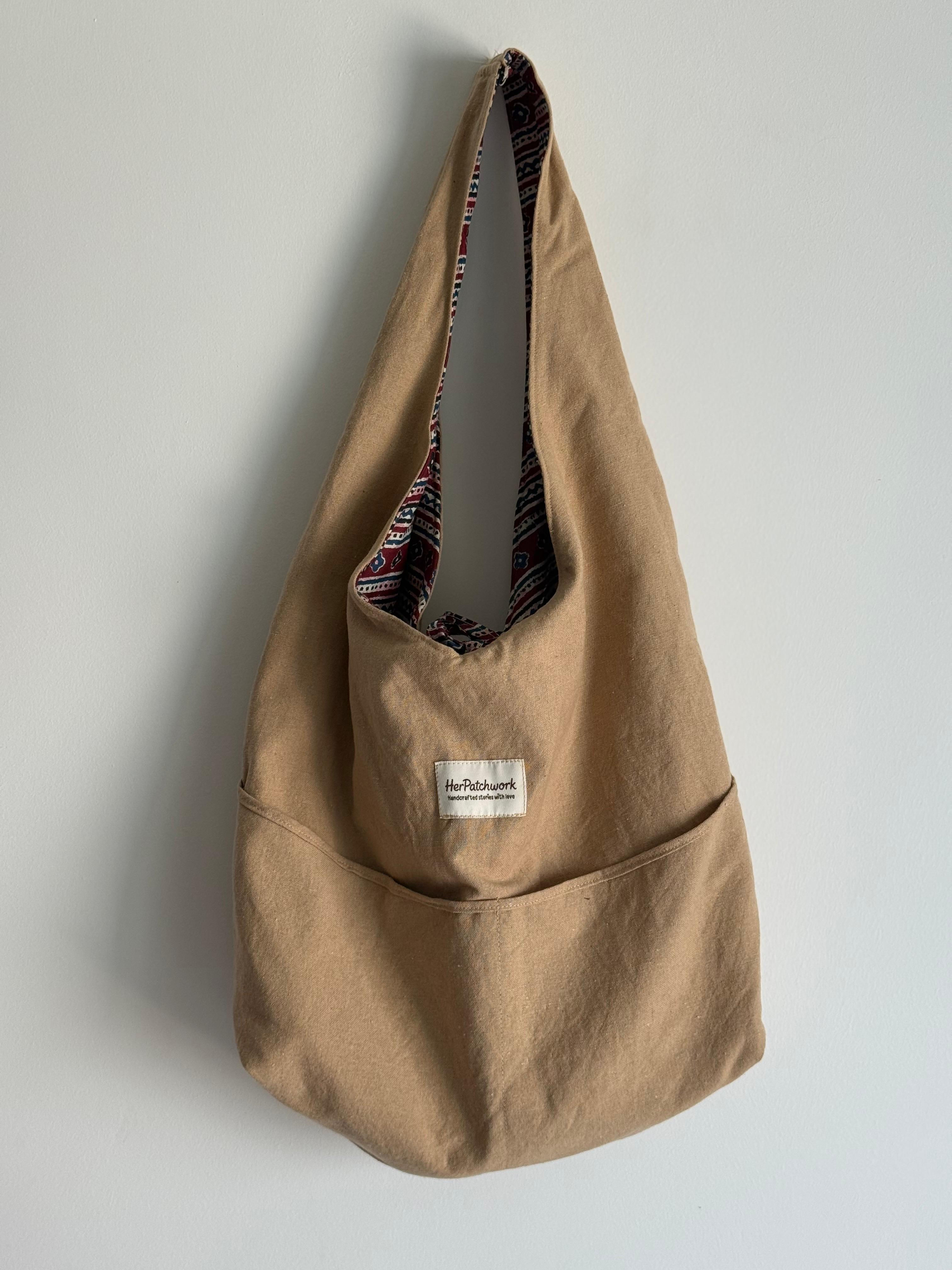 Beige reversible slouchy bag