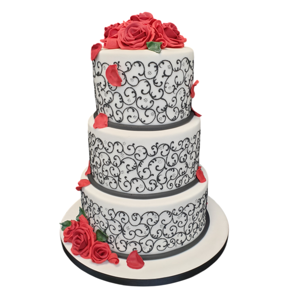 Three-tiered wedding cake with black scrollwork and vibrant red roses.