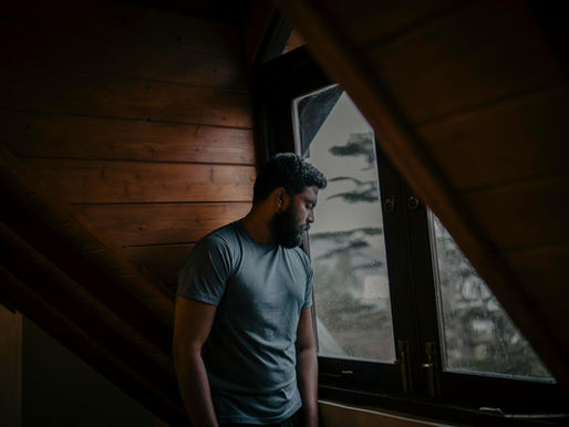 Man looking out of the window