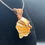 Thumbnail: Wrapped Orange Calcite Necklace, Courtesy of One Thirty One