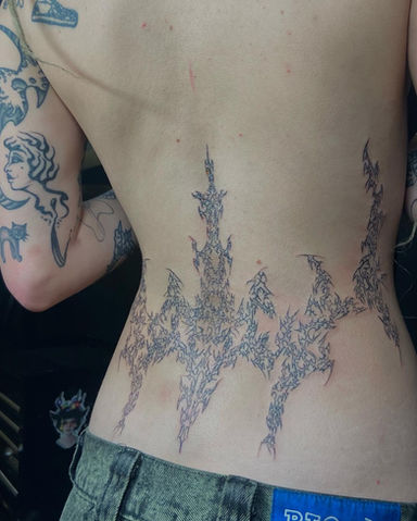Intricate back tattoo design