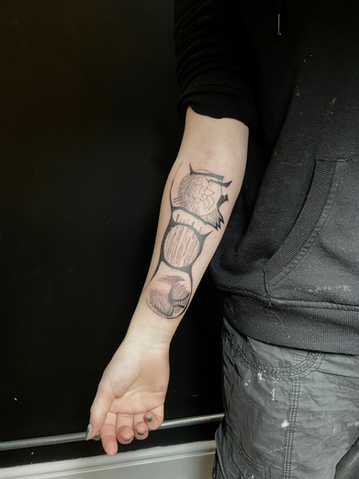Person's arm with new Princelet tattoo