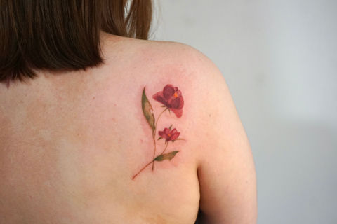 Watercolor floral shoulder tattoo