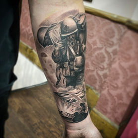 fallen soldier black and grey realism tattoo london military theme detailed shading realism tattoo