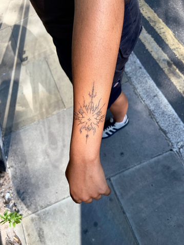 Person's forearm with new Princelet Tattoo