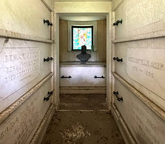 interior of a mausoleum, with crypts