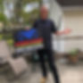Mitch with New Sign.jpg