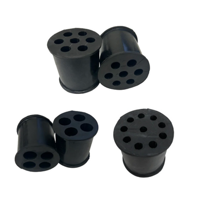 Rubber cable hanger grommet protecting telecom cable jackets from abrasion