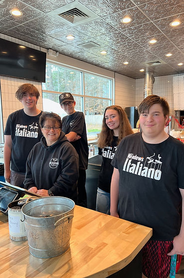 Mooresville Pizza & Italian Food: Meadow's Italiano team stands behind the cashier counter