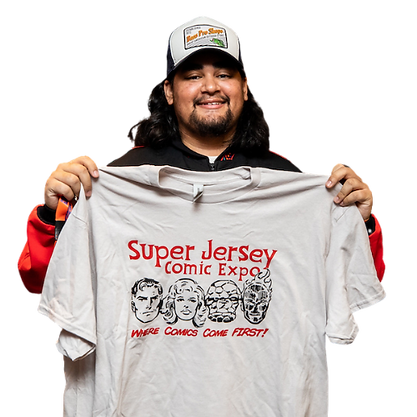 A convention-goer holding super jersey comic expo shirt printed by Think Ink Tees in 2022(now Pines and Prints Co)