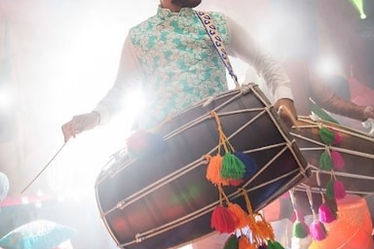 dhol-player-during-sangeet-mehndi-260nw-