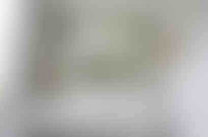 Bespoke antique mirror splashback in London bathroom blending vintage elegance with modern design