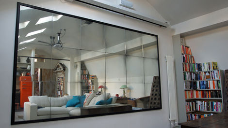 multi-panel mirror wall installation elevating the opulence and style of exclusive venues.