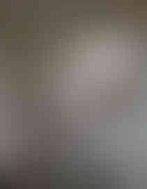 diamond cut mirror wall installation in entrance alcove reflecting light and creating space